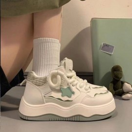These Adorable Sneakers Have a White Foundation with Green Highlights, a Thick Sole, And Whimsical Laces, Bringing a Lively And Fashionable Touch to Your Outfit.